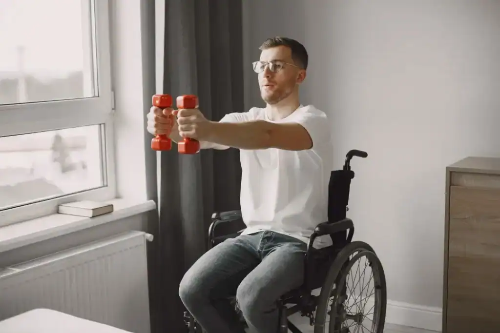 Empowering Weight Loss: A Comprehensive Guide for Individuals with Disabilities 1 Image of man doing exercise in his wheelchair to aid weight loss Lutterworth