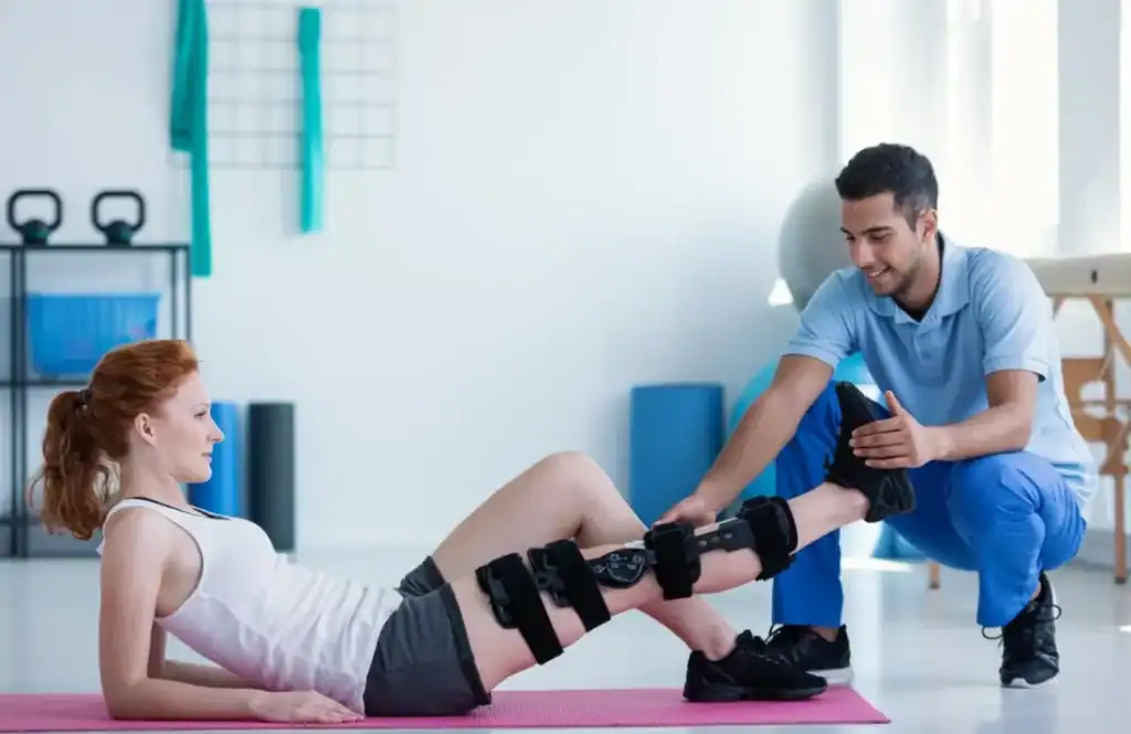Debunking Meal Timing Myths: The Truth About Muscle Recovery 1 Woman having treatment to help muscle recovery Lutterworth after an injury